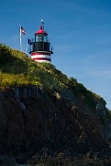 West Quoddy Head Lighthouse Tower on Rocky Edge in Maine
